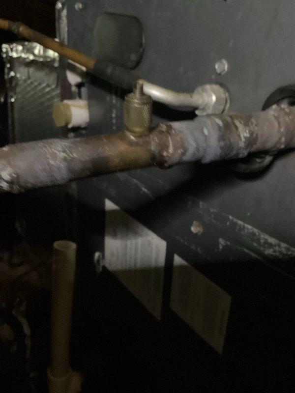 Responded to no cooling complaint on 15-year-old Goodman system. Found compressor fan motor not running while air handler operated normally. Condenser fan motor was buzzing and extremely hot to touch, indicating seized bearings or failed capacitor. Diagnosed failed condenser fan motor requiring replacement to restore cooling operation.