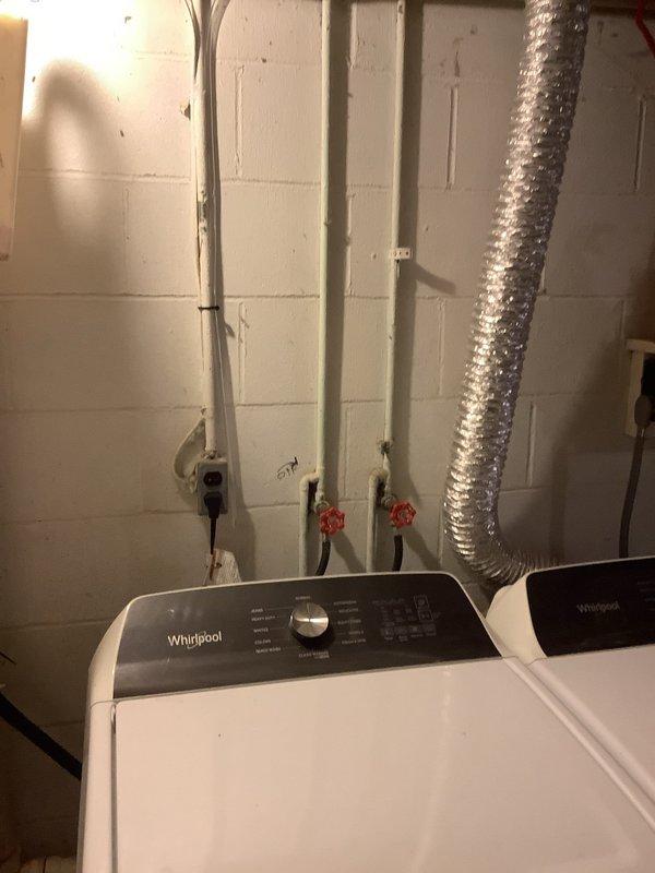 Responded to emergency call for toilet leaking into basement. Upon arrival, confirmed active water leak requiring immediate attention and temporary containment. Removed existing failed toilet and installed customer-supplied replacement unit. Ensured proper sealing, secure mounting, and verified all connections were leak-free. Tested flush operation and confirmed no water intrusion to basement area below. 

Provided estimate for future installation of comfort height elongated bowl toilet with option for pressure-assisted model to accommodate accessibility needs. Also provided separate estimate for relocating washer and dryer hookups to third bedroom, including necessary plumbing modifications for water supply lines, drain connections, and venting requirements.