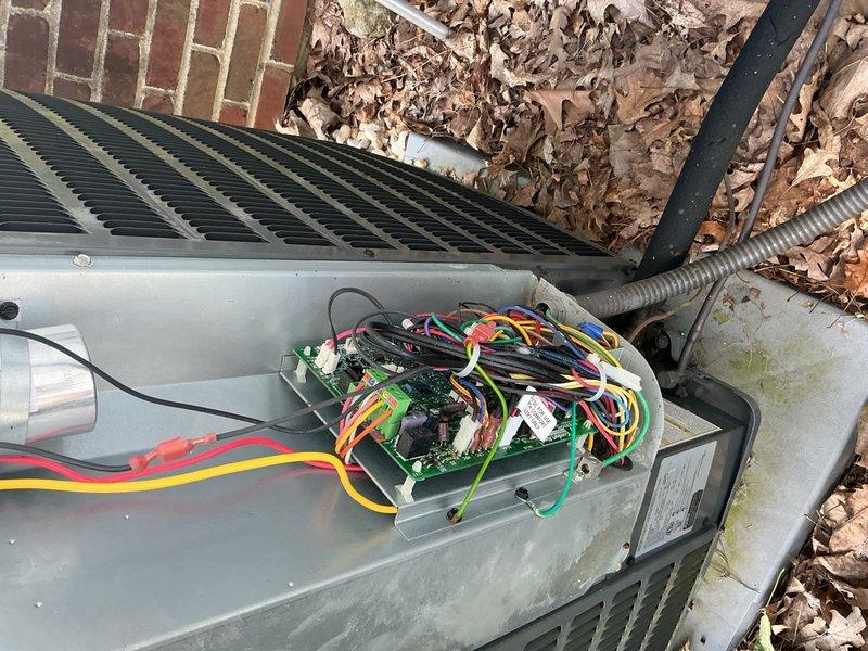Completed comprehensive preventive maintenance inspection on residential air conditioning system. Accessed and inspected outdoor condenser unit electrical components including control board, wiring connections, and safety controls; all terminals secure with no signs of overheating or deterioration. Evaluated indoor evaporator coil assembly in attic space, confirming proper refrigerant flow through copper tube circuits and heat exchanger fins. System operational and performing within normal parameters.