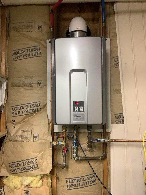 Responded to service call for no hot water issue affecting seven Kohler shower heads while all other fixtures had hot water. Inspected Rinnai tankless gas water heater installation and verified unit operation, connections, and temperature settings. Diagnosed and resolved flow rate issue preventing adequate hot water delivery to multiple shower head system, restoring full hot water function to all shower fixtures.