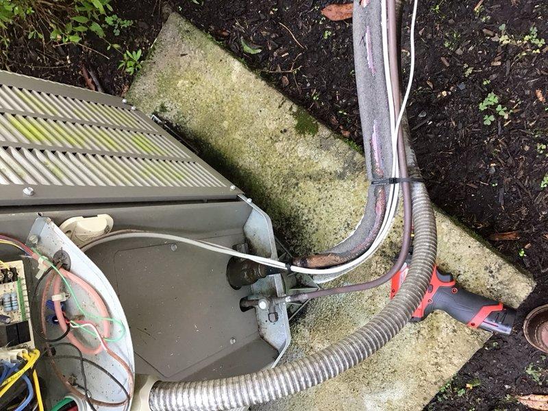 Completed comprehensive heat pump tune-up and preventative maintenance on two systems under CPM cooling agreement. House unit is a Lennox system installed in November 2019; garage unit is a Daikin Fit installed in August 2023. Inspected electrical control panels, wiring connections, and terminal strips on both systems. Cleaned blower wheel as needed. Checked refrigerant lines, capacitors, and outdoor condenser units. Noted biological growth present on outdoor unit covers and surrounding concrete surfaces. All electrical connections verified secure, systems operating within normal parameters. Both heat pumps tested and confirmed functioning properly for cooling season.