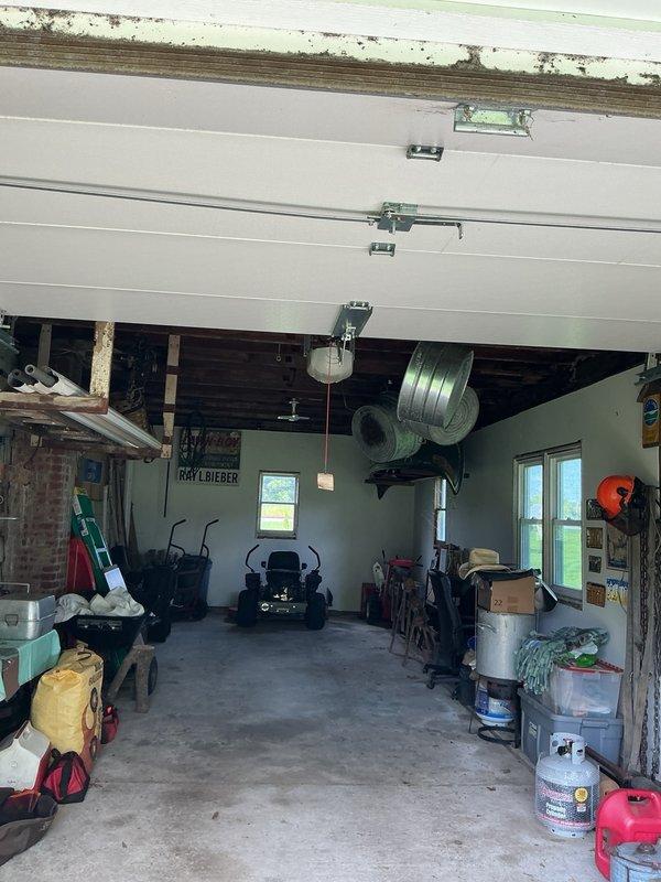 Completed comprehensive CPM A/C inspection including cleaning of indoor blower assembly and replacement of indoor blower capacitor to restore proper system operation. Evaluated furnace venting configuration due to existing main chimney having a vertical crack requiring removal, and assessed alternative venting location options for future implementation.