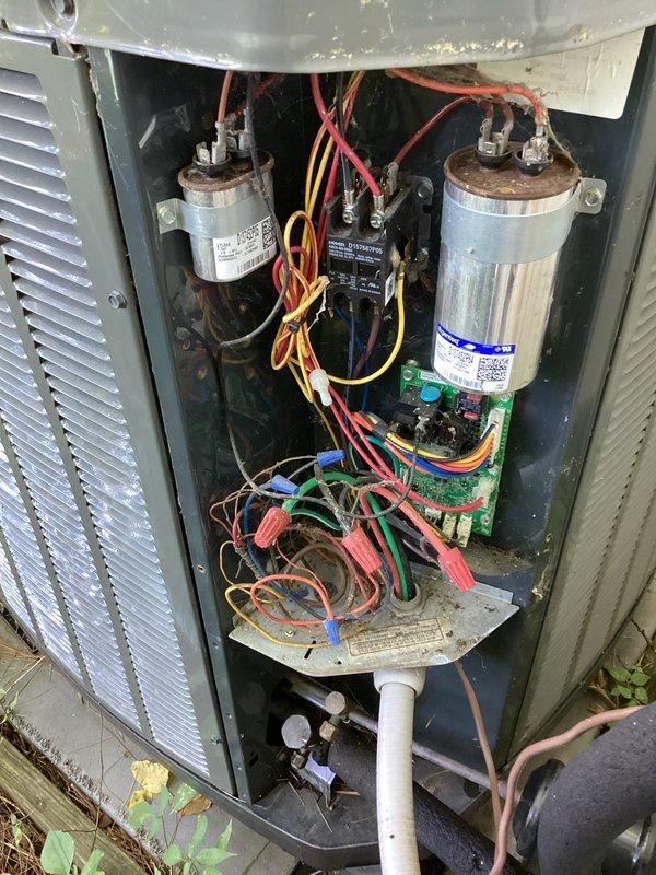 Completed preventive maintenance inspection on Trane air conditioning system installed in 2016. Replaced two air eliminators in the hydronic piping system due to extensive corrosion and verdigris buildup on copper components. Installed emergency shut-off switch for enhanced safety and code compliance. Inspected electrical components including dual capacitors showing signs of terminal corrosion and verified all wire connections at contactor and control board. System operational upon completion.