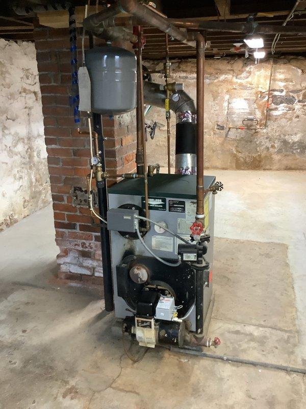 Completed oil clean and service on heating system experiencing intermittent error codes requiring manual resets since another contractor's February cleaning. Performed thorough cleaning and inspection of boiler unit, expansion tank, piping connections, and associated controls to restore reliable operation and eliminate nuisance shutdowns.