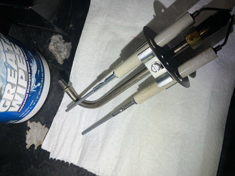 Completed comprehensive oil cleaning and service on Thermo Dynamics oil boiler originally installed in December 2016. Replaced .85/80B nozzle and 1A-25A oil filter, inspected fuel pump assembly and hydraulic components, and verified all system connections and electrical terminals were secure and functioning properly. System tested and left in full operational condition.