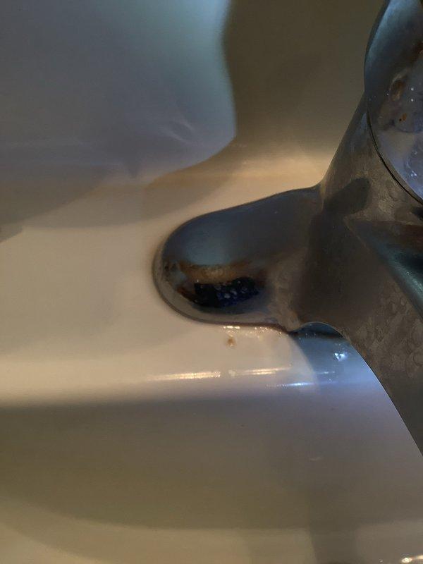 Responded to customer complaint of high water bills despite discontinuing outdoor watering. Inspected both toilets in residence and identified continuously running mechanisms as primary cause of excessive water consumption. Found deteriorated internal components (flappers, fill valves, and flush mechanisms) in both units requiring replacement. Observed corroded hardware and compromised wax ring seals at base of fixtures with visible water staining on floor surfaces. Presented repair options including minor rebuild with replacement of internal components, major rebuild with new flanges and complete gut replacement, and full toilet replacement with standard or pressure-assisted models. Documented existing conditions with photographs showing base deterioration, floor staining, and corroded flush mechanisms. Provided customer with detailed estimates for each repair option to address ongoing water loss issue.