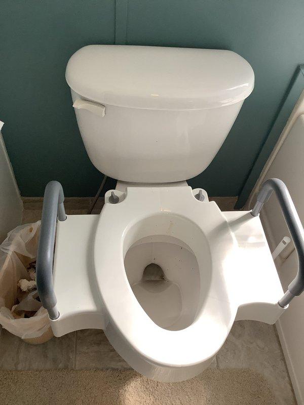 Responded to service call for reported toilet float issue. Upon inspection, examined all internal tank components including fill valve with functional red cap, flush valve assembly with intact flapper seal, and overflow tube. All mechanisms were found to be in proper working condition with normal water levels and no signs of malfunction or component failure. Determined that existing float and fill valve system did not require replacement at this time.
