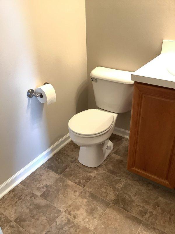 Completed replacement of three white elongated bowl, comfort height toilets with standard flush mechanisms throughout the residence. Repaired wall damage at final toilet location and made all necessary water supply connections. Installed two customer-supplied showerheads and one customer-supplied lavatory faucet as additional scope items.