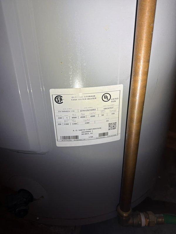 Replaced failed water heater with new A.O. Smith 50-gallon electric storage tank model EX-50EA50DV rated at 240V/4500W, installed new expansion tank, and replaced pressure reducing valve with like unit to resolve high water pressure issues affecting Moen whole house automatic shut-off system.