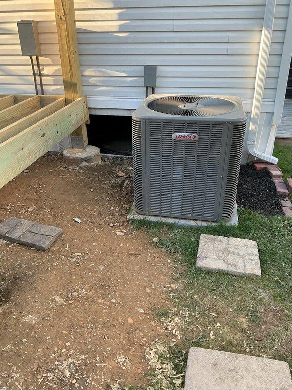 Relocated the Lennox condenser unit and raised it 4"-6" to accommodate the new deck construction, ensuring proper clearance and airflow around the unit. Inspected the heat tape beneath the home and verified it was functioning properly. Unit was left clean and intact, with no visible damage, rust, or frost.