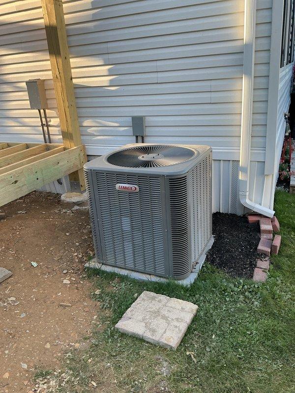 Relocated the Lennox condenser unit and raised it 4"-6" to accommodate the new deck construction, ensuring proper clearance and airflow around the unit. Inspected the heat tape beneath the home and verified it was functioning properly. Unit was left clean and intact, with no visible damage, rust, or frost.