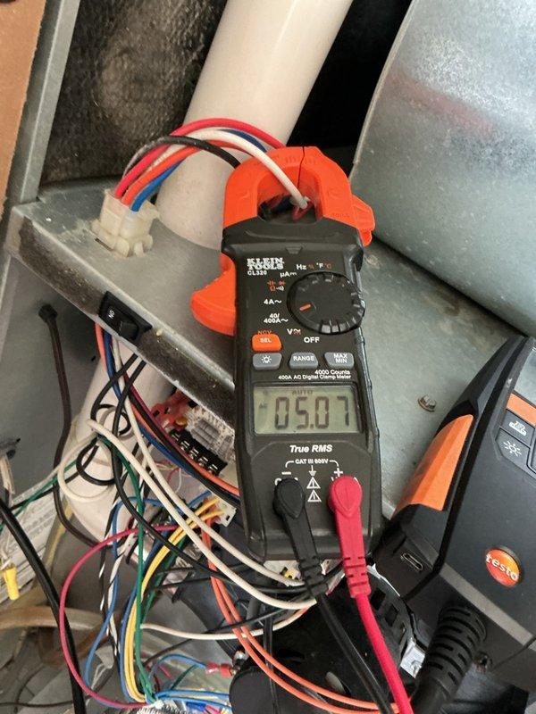 Performed a preseason tune-up on the propane-fired furnace, including inspection of the burner assembly and flame characteristics, with attention to proper combustion given the customer's concern about possible blockage and carbon monoxide. Verified blower motor amperage with a clamp meter, checked electrical connections and control board wiring, and confirmed the unit was operating properly.