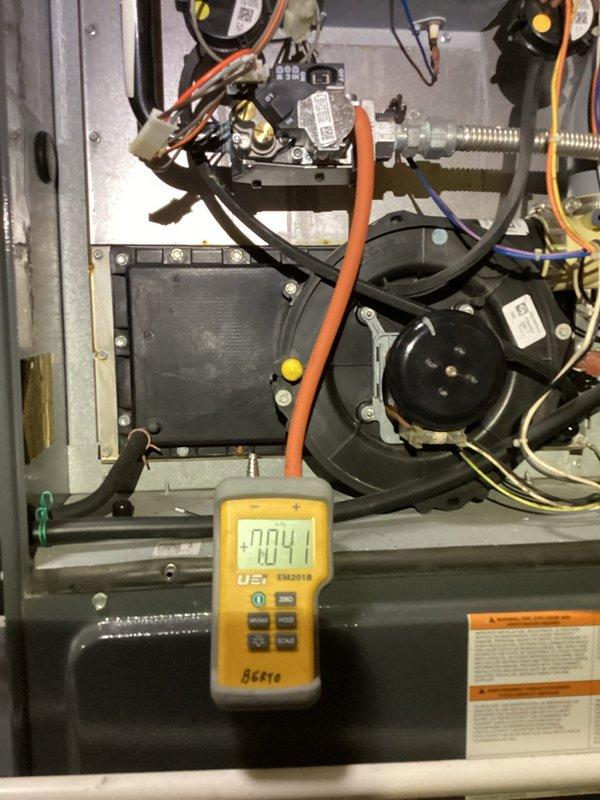 Replaced the faulty gas valve on the furnace, which was intermittently failing to operate unless tapped. After installation, verified gas supply and manifold pressure with a digital manometer, confirming a proper reading within specification. Inspected the surrounding gas train, inducer assembly, and pressure switch wiring, and confirmed normal operation.