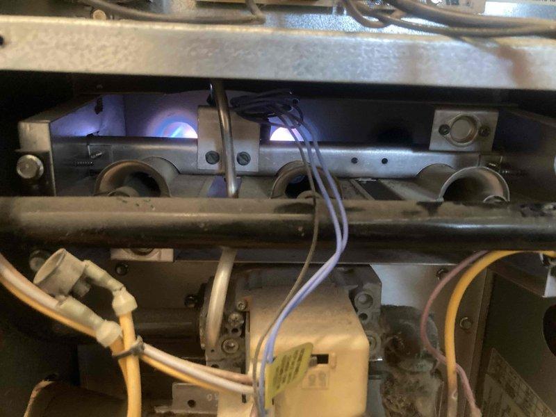 Responded to no heat complaint where tenant reported gas odor near aging furnace. Upon inspection, found corroded gas valve connection and faulty ignition control module. Replaced gas valve, installed new ignition module, and performed safety checks confirming proper operation with no gas leaks.
