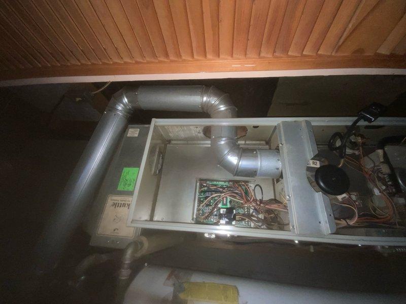 Diagnosed furnace in attic installation showing no heat condition. Inspection of circuit board revealed failed inducer motor preventing proper ignition sequence. Replaced inducer assembly, verified proper operation through complete heating cycle, and confirmed system is now functioning correctly with normal flame pattern and temperature rise.