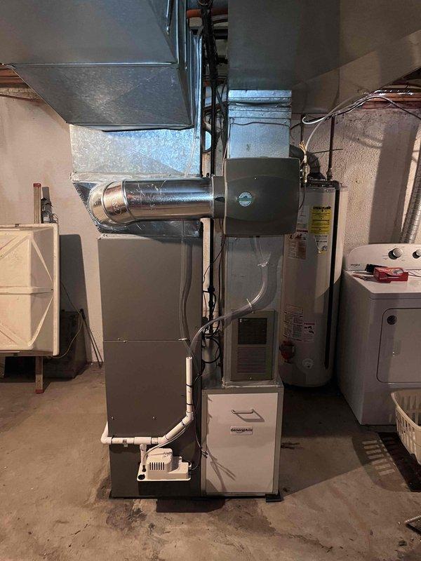 Successfully installed a complete HVAC system including a 70,000 BTU furnace and 2-ton AC unit with associated ductwork and electrical connections. System installation included humidifier integration and proper reconnection of all components according to manufacturer specifications. Final inspection confirmed proper operation of the entire system with all required safety measures in place.