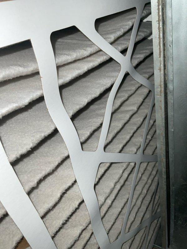 Performed City Inspection/PTU on system, documenting existing conditions with photos. Identified heavily soiled air filter with significant dust accumulation requiring replacement. Inspected ductwork in crawlspace, noting condition of flexible ducting and surrounding structural elements.