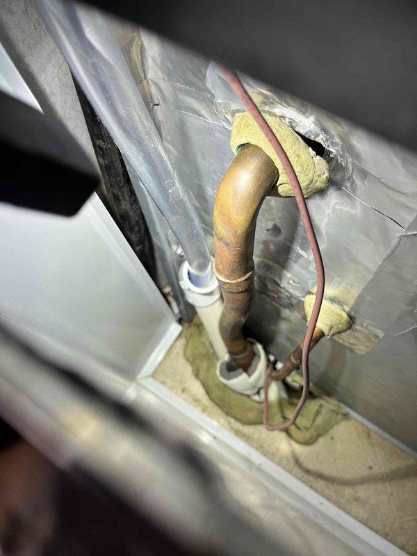 Responded to no-heat service call for Miller wall-mounted unit with reported water leakage around furnace. Upon inspection, identified condensate drain line issue with improper drainage from the secondary condensate tray. Cleaned drain line, verified proper flow, and confirmed system operation with no further leakage.