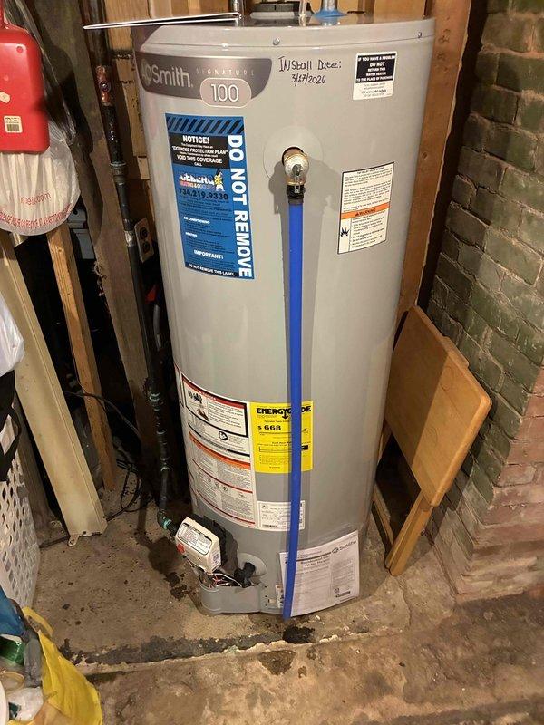 Successfully installed a new A.O. Smith 100-gallon tank water heater in the basement utility area, replacing the previous unit. Connected all necessary plumbing with PEX supply lines and properly vented the system through existing metal ductwork. Unit was tested for proper operation and meets all current energy efficiency standards.