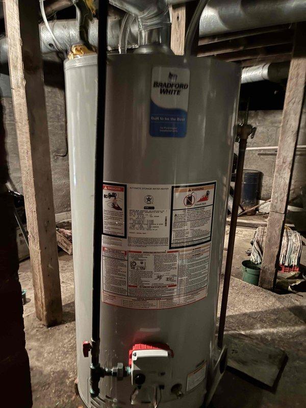 Successfully installed a new Bradford White tanked water heater in the utility area, complete with proper connection of all supply lines, discharge piping, and gas fittings. Verified proper operation of temperature control valve and conducted final inspection to ensure all connections were secure with no leaks present.