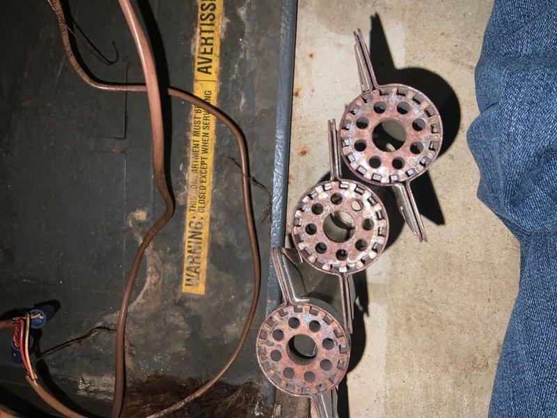 Performed routine maintenance on Club Heat system. Inspected and documented condition of burner rings showing normal wear. Checked copper lines and connections for proper installation and operation.