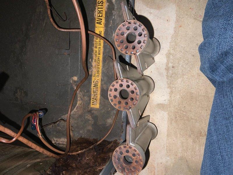 Performed routine maintenance on Club Heat system. Inspected and documented condition of burner rings showing normal wear. Checked copper lines and connections for proper installation and operation.
