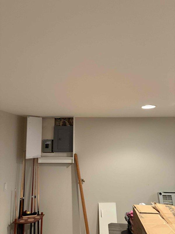 Relocated AC power line and installed new GFCI outlet in compliance with electrical code requirements. Accessed main electrical panel to complete necessary circuit modifications and ensured proper grounding of all components. Verified functionality of the newly installed outlet with appropriate testing procedures.