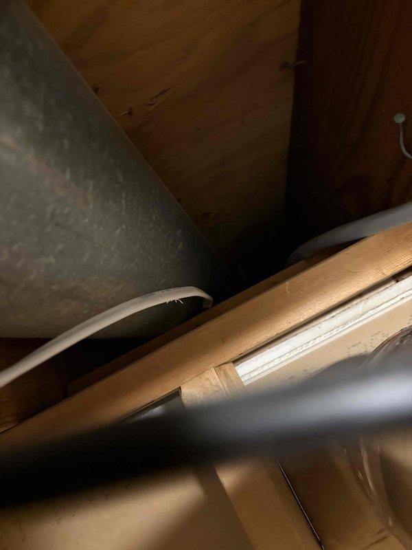 Relocated AC power line and installed new GFCI outlet in compliance with electrical code requirements. Accessed main electrical panel to complete necessary circuit modifications and ensured proper grounding of all components. Verified functionality of the newly installed outlet with appropriate testing procedures.