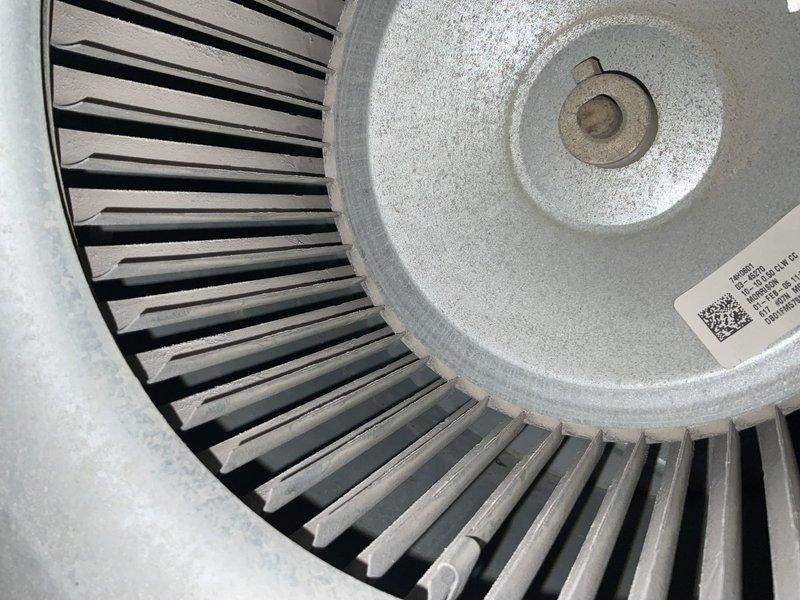 Performed scheduled maintenance on club AC8-12 unit, including inspection of the igniter component which showed signs of wear with visible discoloration on the metallic rod. Examined blower wheel assembly, noting proper fin alignment and confirming central hub integrity. Documented all components with photos for service record.