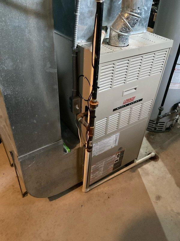 Performed inspection of existing HVAC system and identified two critical failures in the heat exchanger of the Bryant furnace, resulting in immediate danger tagging of the unit. Prepared comprehensive replacement quote for new furnace installation, documenting the existing setup including ductwork configuration and refrigerant line connections. Customer advised to call when technician is en route for replacement service.