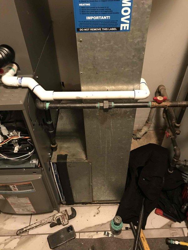 # Service Report

Responded to callback for no water pressure in kitchen following HVAC installation. Upon arrival, inspected plumbing connections and water supply lines in mechanical room to identify potential interference with domestic water system. Verified HVAC condensate drainage and gas line installations were properly configured and not impacting household water pressure, documented system with photos for service records.