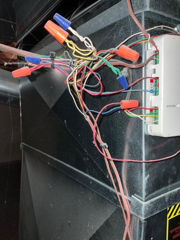 Completed preventative maintenance agreement visit for Club AC12-4 service on air conditioning and system inspection. Performed thorough inspection of indoor air handler unit, verifying proper control board operation and low-voltage wiring connections at System C terminal block. Inspected outdoor electrical disconnect panel and verified proper operation of Intermatic AG3000 Series surge protective device. All electrical connections, conduit, and system components found to be functioning within normal parameters.