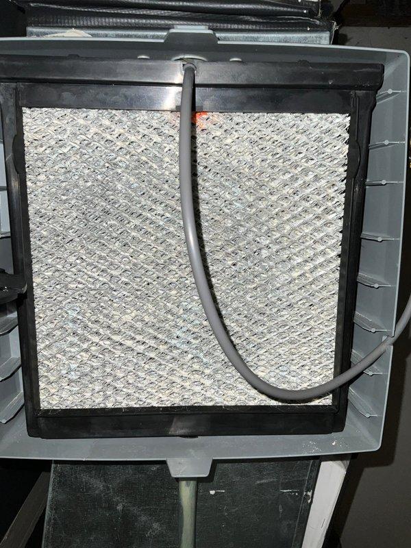 Completed comprehensive air conditioning maintenance tune-up on a five-year-old system. Performed standard seasonal maintenance procedures including inspection of air handler components, examination of ductwork connections, and assessment of air filtration system. Filter showed moderate dust accumulation consistent with normal operation and was inspected as part of routine preventive maintenance protocol. All HVAC equipment and connections were evaluated for proper operation and system integrity during the scheduled morning service visit.