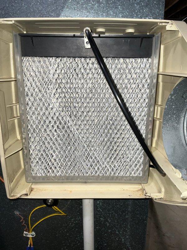 Completed preventive maintenance tune-up on residential HVAC system as part of membership agreement. Inspected air handler filter compartment, verified proper filter installation and airflow, checked electrical connections and condensate drain line operation. All system components found operating within normal parameters with no deficiencies noted.