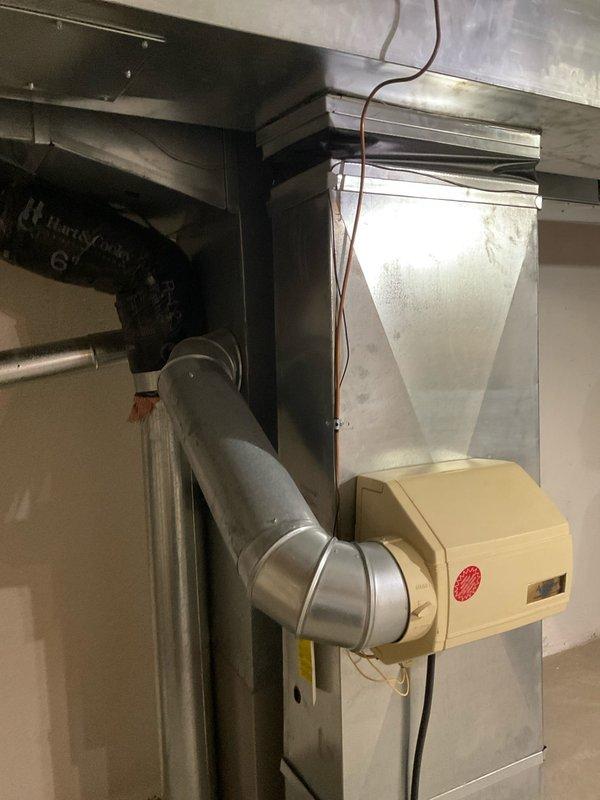 Conducted comprehensive HVAC system assessment for residential replacement estimate. Evaluated existing Bryant furnace installation, associated ductwork configuration, humidifier integration, and air handling components in basement location. Documented current equipment condition, duct connections, condensate drainage system, and overall mechanical room layout to prepare accurate replacement specifications for 8-10 ton air conditioning system upgrade.