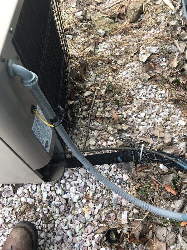 Completed annual AC maintenance visit under prepaid membership agreement. Performed comprehensive tune-up on residential air conditioning system including inspection of outdoor condensing unit, contactor assembly, and electrical connections. Visual inspection revealed outdoor unit in operational condition with normal wear patterns on contactor and some age-related corrosion on electrical panel components. Verified proper drainage through condensate line, checked refrigerant line connections, and confirmed unit positioned securely on concrete pad with adequate clearance. All electrical connections tested and found functional despite visible oxidation on mounting panel. System operational and ready for cooling season.