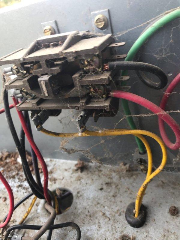 Completed annual AC maintenance visit under prepaid membership agreement. Performed comprehensive tune-up on residential air conditioning system including inspection of outdoor condensing unit, contactor assembly, and electrical connections. Visual inspection revealed outdoor unit in operational condition with normal wear patterns on contactor and some age-related corrosion on electrical panel components. Verified proper drainage through condensate line, checked refrigerant line connections, and confirmed unit positioned securely on concrete pad with adequate clearance. All electrical connections tested and found functional despite visible oxidation on mounting panel. System operational and ready for cooling season.