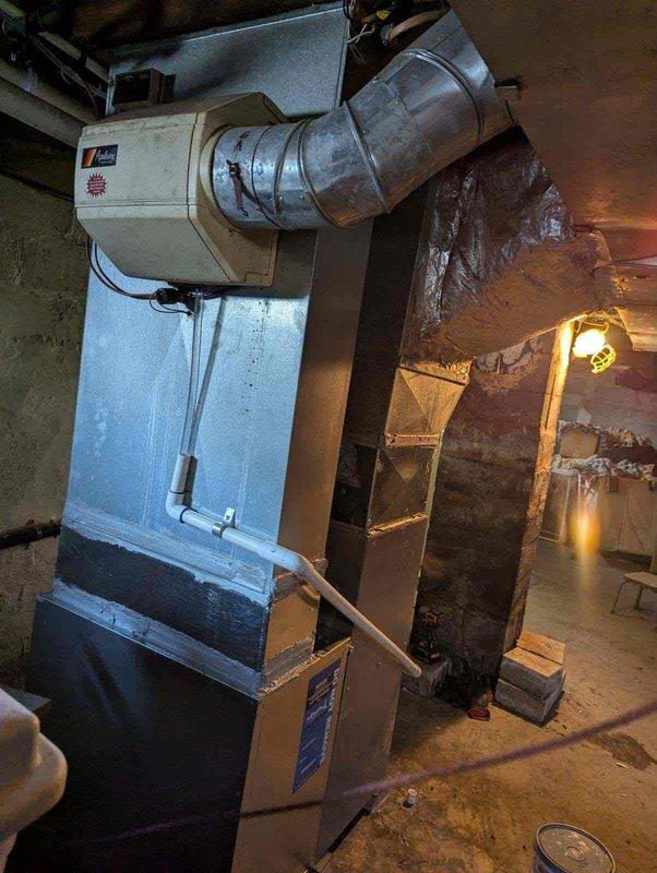 Completed installation of 70,000 BTU gas furnace in basement utility area, including all mechanical and electrical connections. Reconnected existing ductwork, installed condensate pump with drainage piping, ran gas line to unit, and verified proper operation of all system components upon completion.