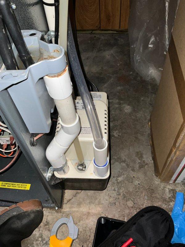 Completed preventive maintenance agreement visit for air conditioning system and supplemental inspection. Performed comprehensive inspection of basement-installed air handler unit, verified proper operation of condensate pump and drainage system, checked refrigerant line insulation integrity, and documented equipment condition with photographic records. All components found operating within normal parameters with no immediate service needs identified.