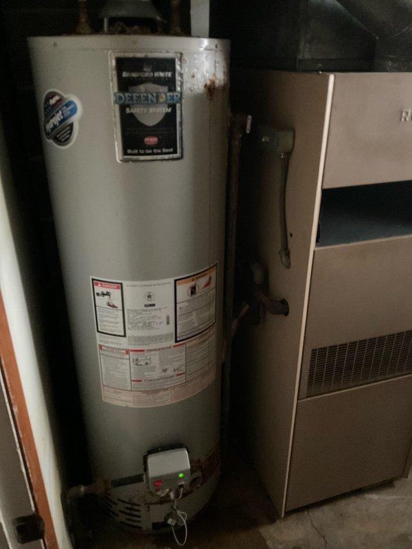Provided comprehensive estimate for water heater replacement in residential utility space. Evaluated existing water heater installation, including current plumbing connections, venting configuration, and proximity to HVAC equipment. Documented existing copper supply lines, discharge piping, and safety system components. Assessed installation location constraints in basement mechanical room and clearance requirements for new unit. Photographed current equipment specifications and mechanical room layout to ensure accurate sizing and compliance with local plumbing codes for replacement installation.