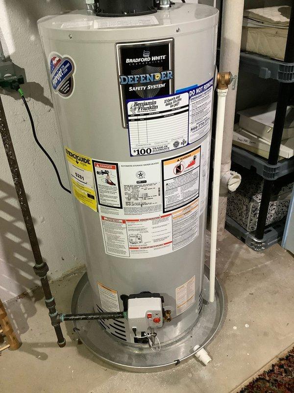 Completed preventive maintenance tune-up on residential air conditioning system and inspected two Bradford White 100-gallon water heaters. Performed electrical diagnostics on outdoor AC unit, recording amperage draw of 12.99 amps, and verified all system components including condenser operation, refrigerant lines, and condensate drainage are functioning within normal parameters.