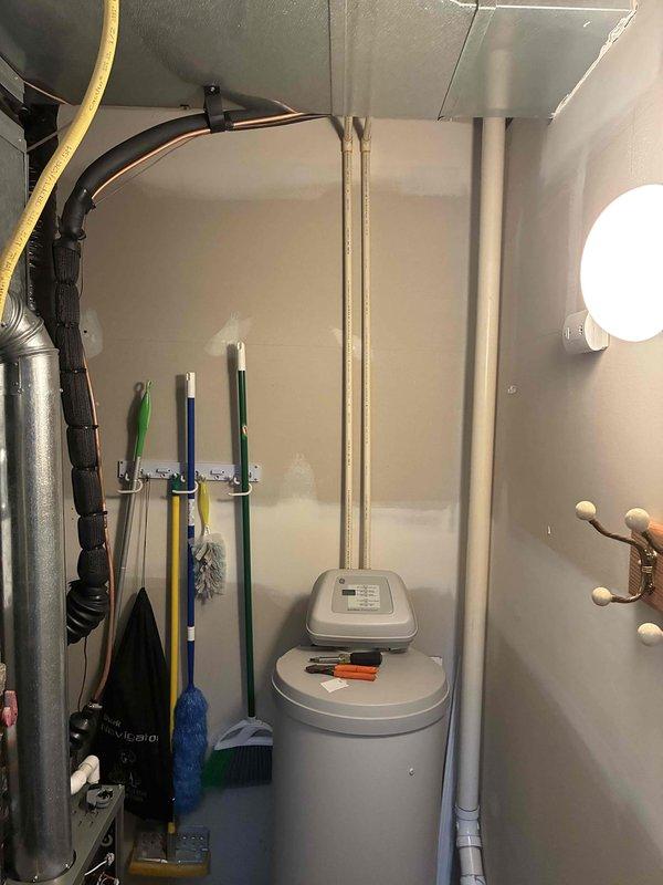 Completed installation of remaining LP conversion kit components on HVAC system. Relocated and secured refrigerant lineset in furnace room, raising copper lines higher on wall to improve clearance and prevent interference with other mechanical equipment and stored items. Verified all connections, tested system operation, and ensured proper refrigerant line insulation and support.