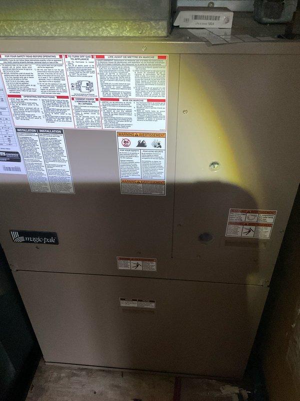 Completed annual air conditioner maintenance on Magic Pak HVAC system as part of preventative maintenance agreement. Performed comprehensive AC tune-up including inspection of evaporator coils, replaced 16x25x1 air filter, verified system operation, and documented unit condition with photos. System is brand new (0 years old) and operating within normal parameters with no issues identified.