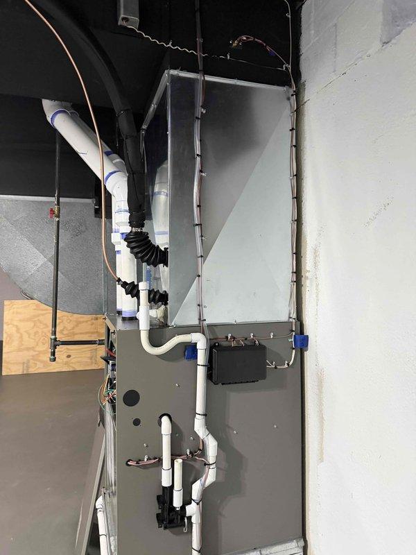 Completed full HVAC system installation including 135,000 BTU gas furnace and 5-ton air conditioning unit with left-side configuration. Installed humidifier, completed all mechanical and electrical connections, and reconnected existing ductwork. System tested and verified proper operation with refrigerant pressures reading 159.1 psig on high side, confirmed vacuum levels, and ensured all components functioning within manufacturer specifications.