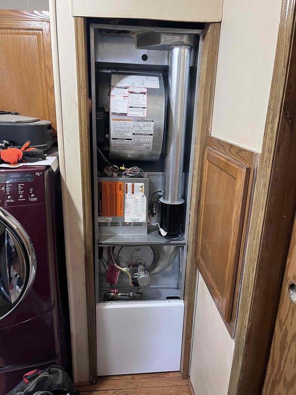 Responded to callback for permit compliance on recent HVAC installation. Replaced flexible gas line with rigid hard pipe per code requirements, ensuring proper connection to furnace unit and eliminating non-compliant flex connector. Documented completed work with photographs for permit records.