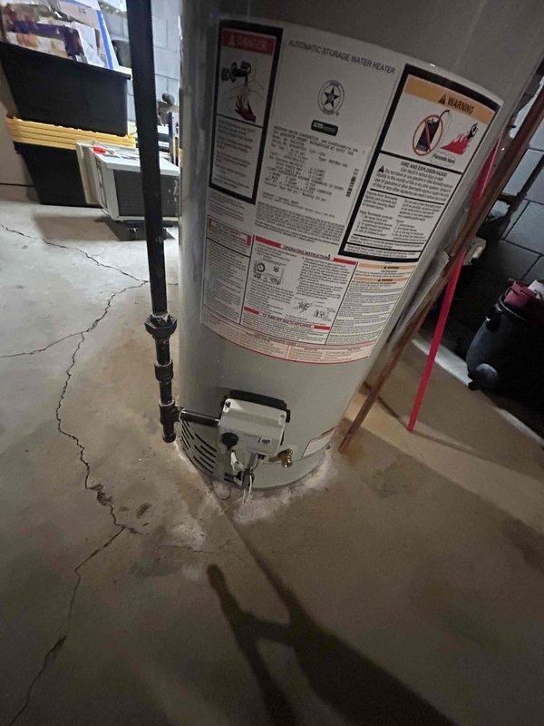 Responded to recall for water heater installation to address improper pressure relief valve discharge piping configuration. Upon inspection, installed compliant discharge tubing to pressure relief valve on Bradford White water heater per code requirements to complete permit correction. System verified operational with proper safety discharge piping now in place.