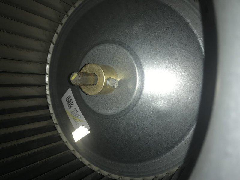 Completed club AC maintenance agreement visit for downstairs portion. Inspected and documented air filter condition showing pleated media with diagonal cross-hatch pattern and blower motor assembly with visible fan blades and shaft components. Both units operational with standard wear noted during seasonal inspection.