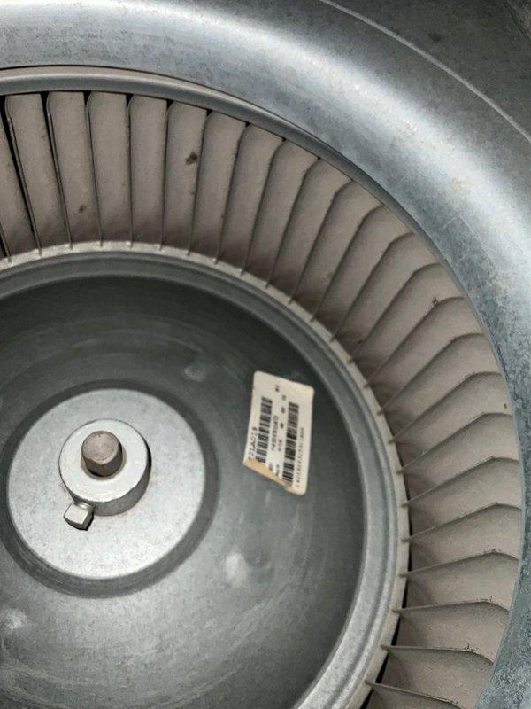 Completed Club AC and Heat12-4 preventive maintenance agreement visit. Inspected blower wheel assembly and found operational condition with normal dust accumulation on blades and housing. Replaced defective thermal fuse safety device that was removed from electrical system to restore proper equipment protection and functionality.