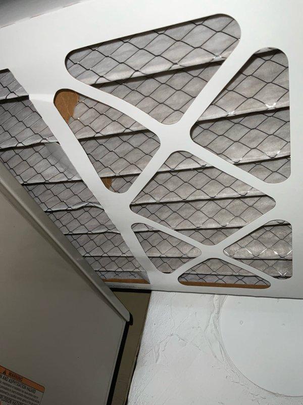 Completed routine HVAC maintenance agreement visit for air handler and system inspection. Inspected and documented existing air filter showing moderate dust accumulation and discoloration, indicating normal usage patterns. Performed system diagnostics and temperature sensor inspection as part of comprehensive preventative maintenance protocol.