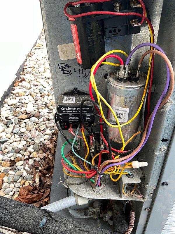 Completed annual AC maintenance inspection as part of prepaid membership agreement. Performed comprehensive tune-up including inspection of electrical control panel, capacitors, and CoreSense monitoring system. Verified all wire connections, tested capacitor functionality, and documented equipment condition with photos. All components operating within normal parameters with no immediate repairs required.